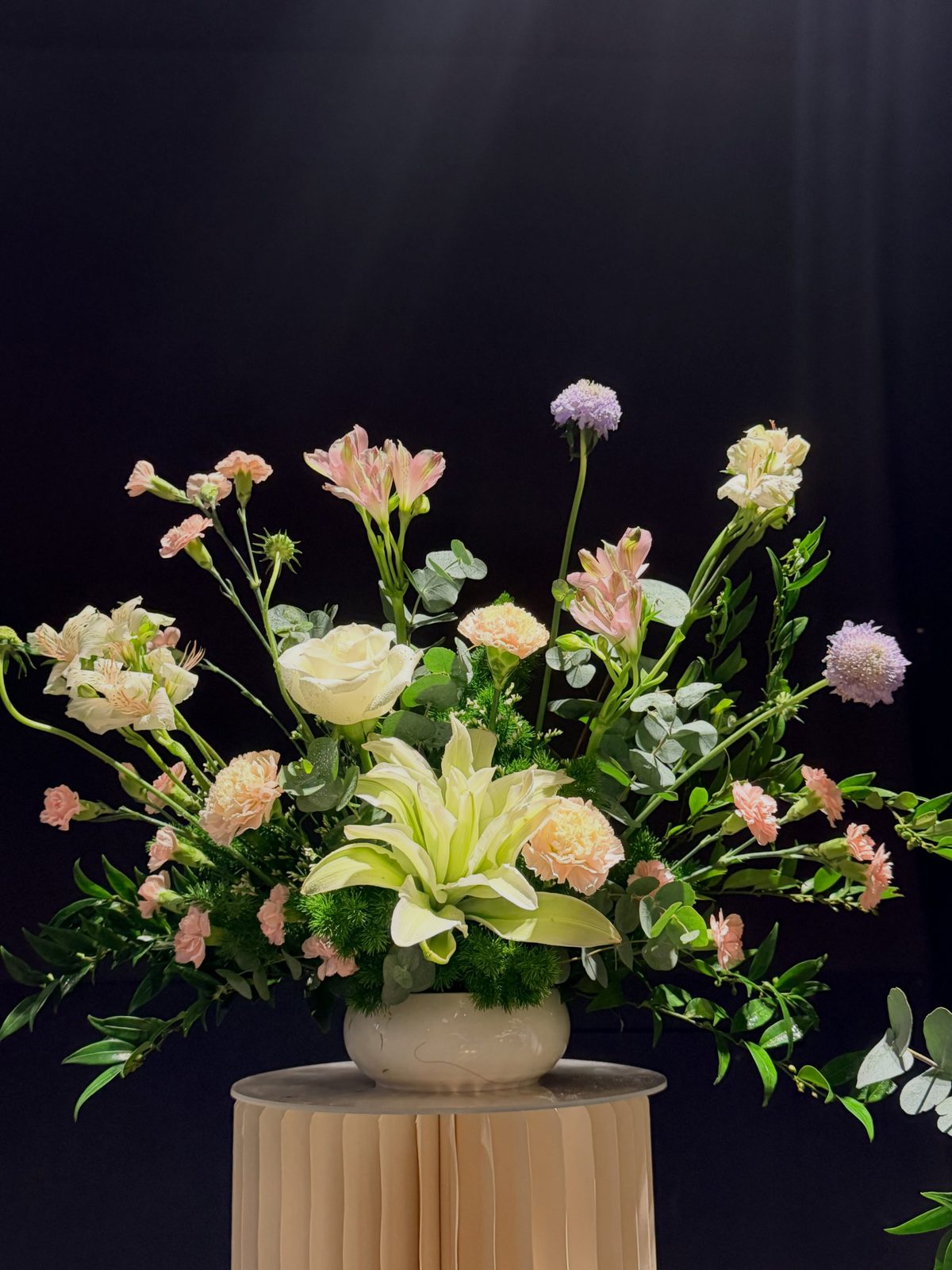 Cream pedestal arrangement
